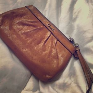Coach cognac/mustard leather wristlet